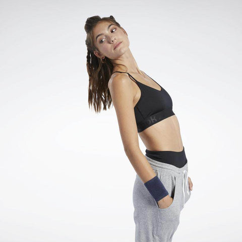 טופ ריבוק לנשים Reebok WOR COMM STRAPPY BACK BRA FQ0397 - RunOFF עכשיו במבצע ב