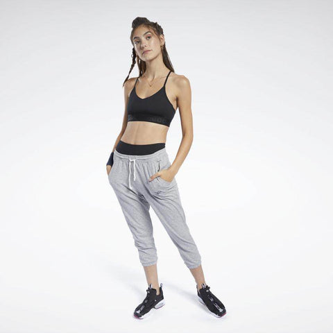 טופ ריבוק לנשים Reebok WOR COMM STRAPPY BACK BRA FQ0397 - RunOFF עכשיו במבצע ב